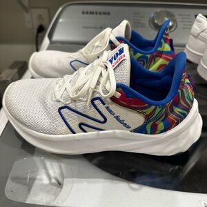 New Balance White and Blue Athletic Shoes with Colorful Pattern